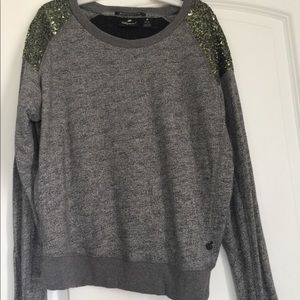 Sweater with sequence scotch and soda.